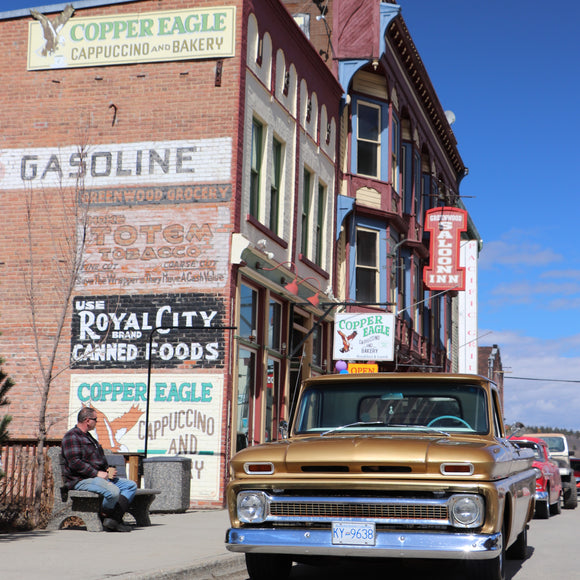 Our Chevy sitting in front of the old buildings in Greenwood British Columbia