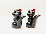 Vintage Redware Pottery Skunk Figurines