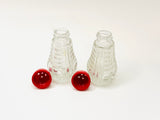 1950’s Glass Salt and Pepper Shakers with Plastic Caddy
