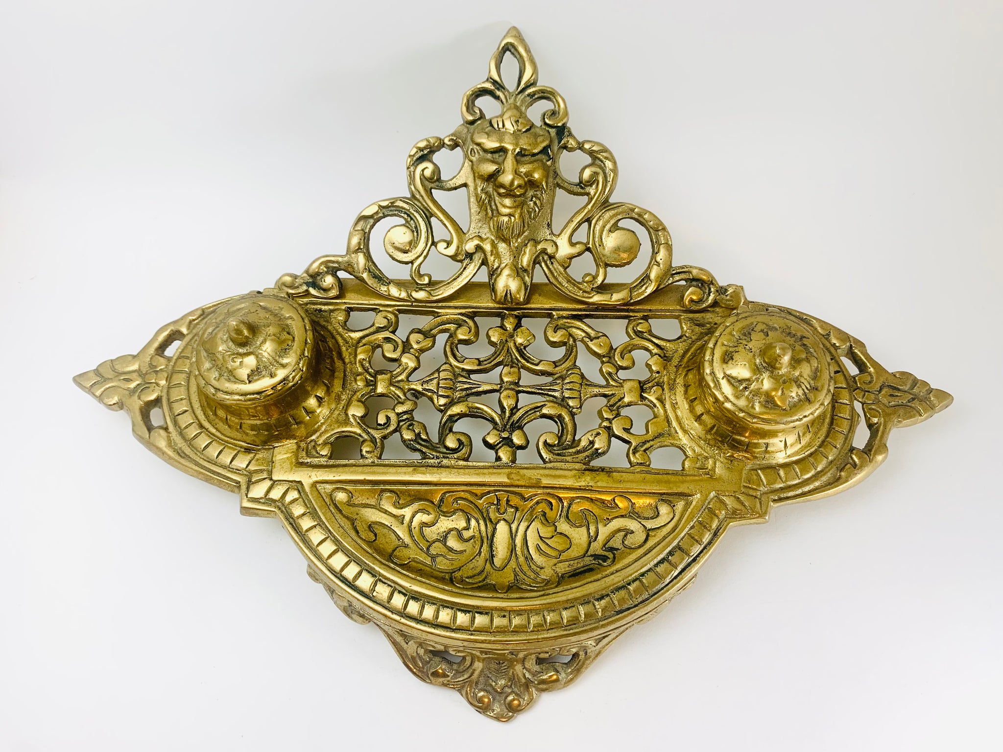 Lot - TWO ORNATE VICTORIAN BRASS INKWELLS, LATE 19TH CENTURY