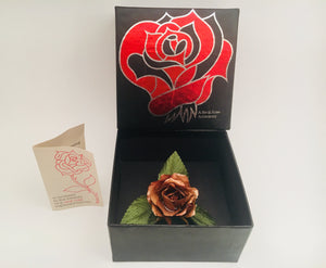 A real rose brooch by Chrystalle Flower Corporation 1980