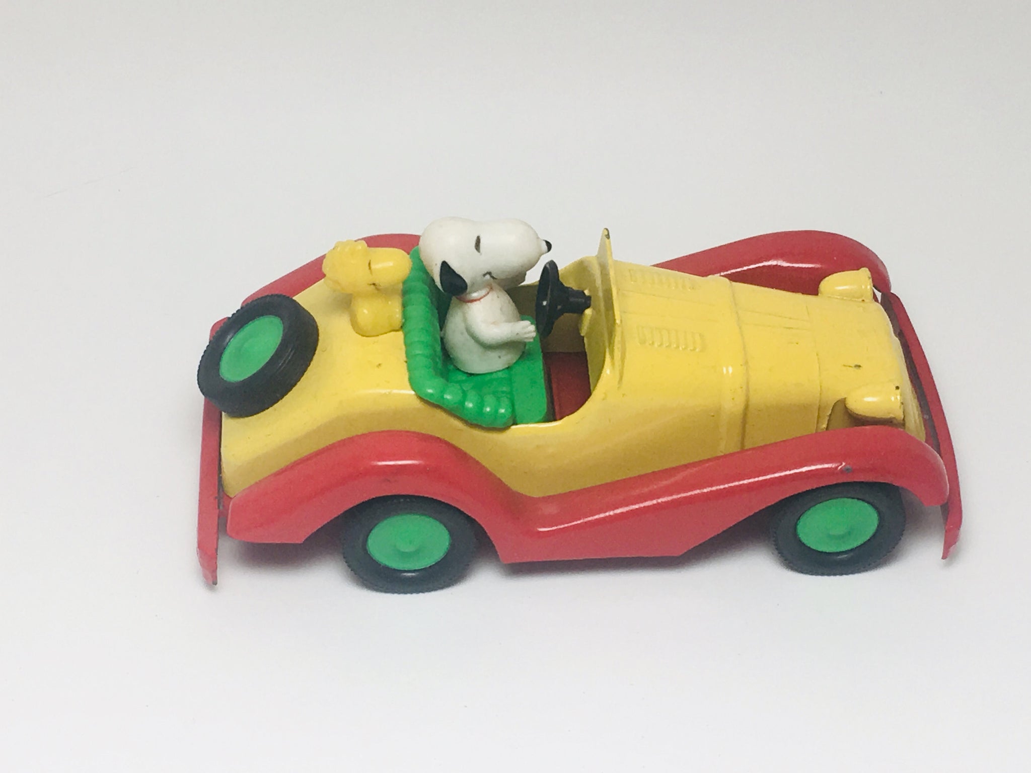 SOLD! 1965 Aviva Toy Co. Snoopy and Woodstock in a race car