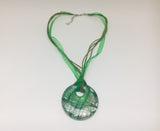 Murano green glass pendant, circle with 925 silver foil on a ribbon necklace.